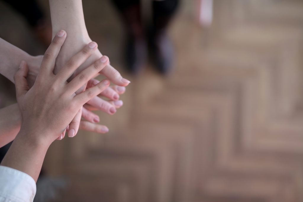 hands held in solidarity