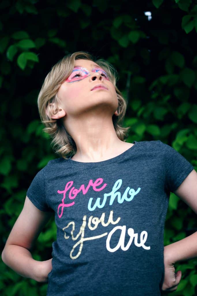 girl wearing 'love who you are' t-shirt